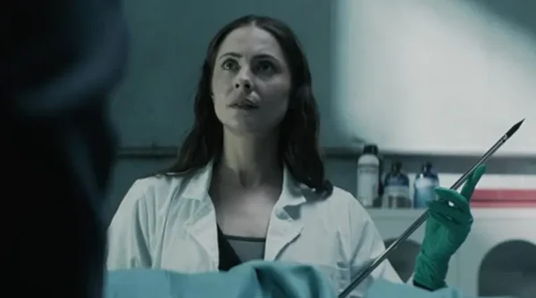 The Mortuary Assistant Review: Jeremiah Kipp's Dread-Inducing Video Game Adaptation Benefits From Willa Holland's Subtle...