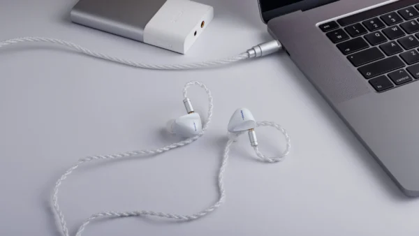 Activo's wired in-ears are inspired by the form of "a pebble shaped by flowing water"