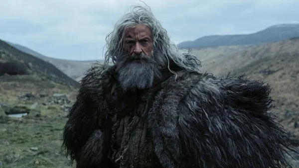 ‘The Death of Robin Hood’ Review: Hugh Jackman, Jodie Comer and Bill Skarsgard Get Mired in the Muck of A24’s Dour...